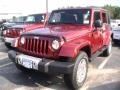Flame Red 2012 Jeep Wrangler Unlimited Sahara 4x4