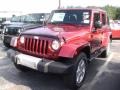2012 Flame Red Jeep Wrangler Unlimited Sahara 4x4  photo #1