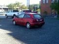 2004 Sangria Red Metallic Ford Focus ZX3 Coupe  photo #2