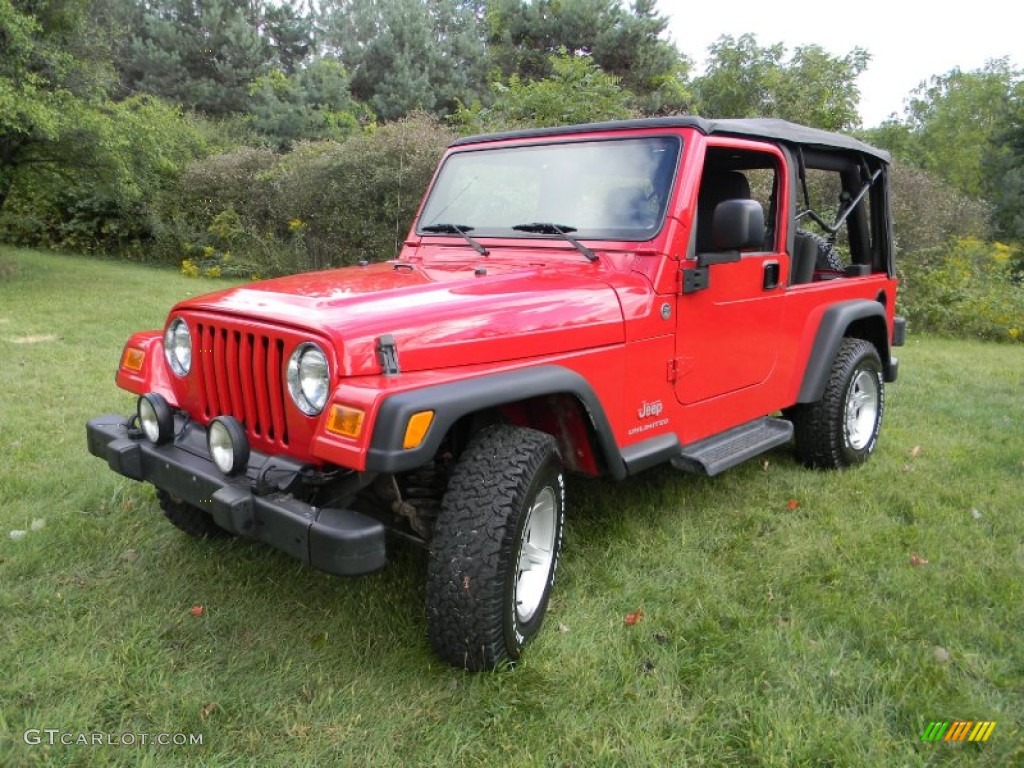 Flame Red 2006 Jeep Wrangler Unlimited 4x4 Exterior Photo #70571388