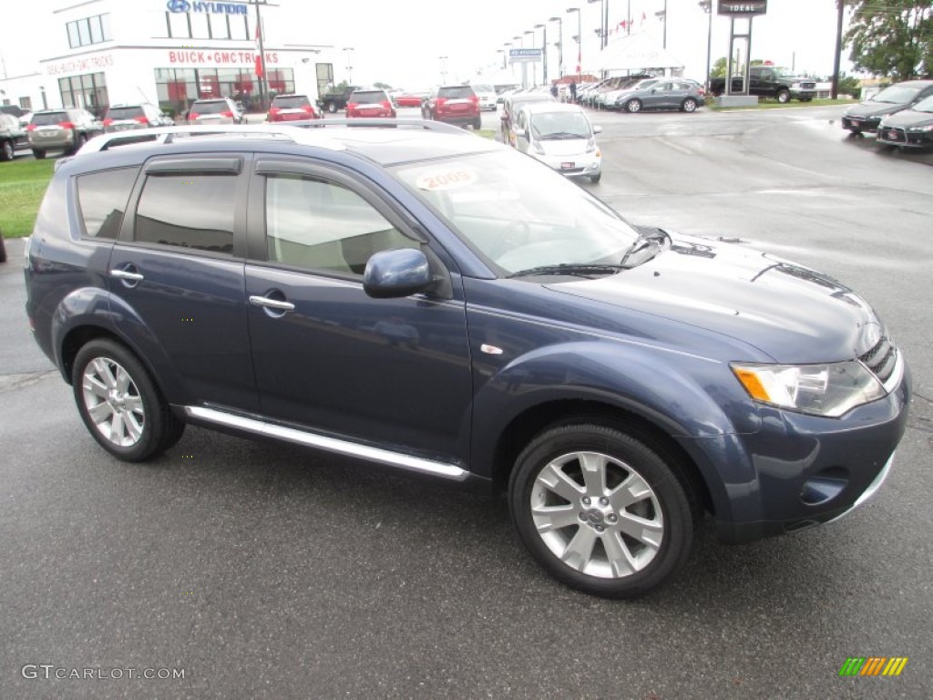 2009 Outlander SE 4WD - Deep Blue Metallic / Beige photo #7