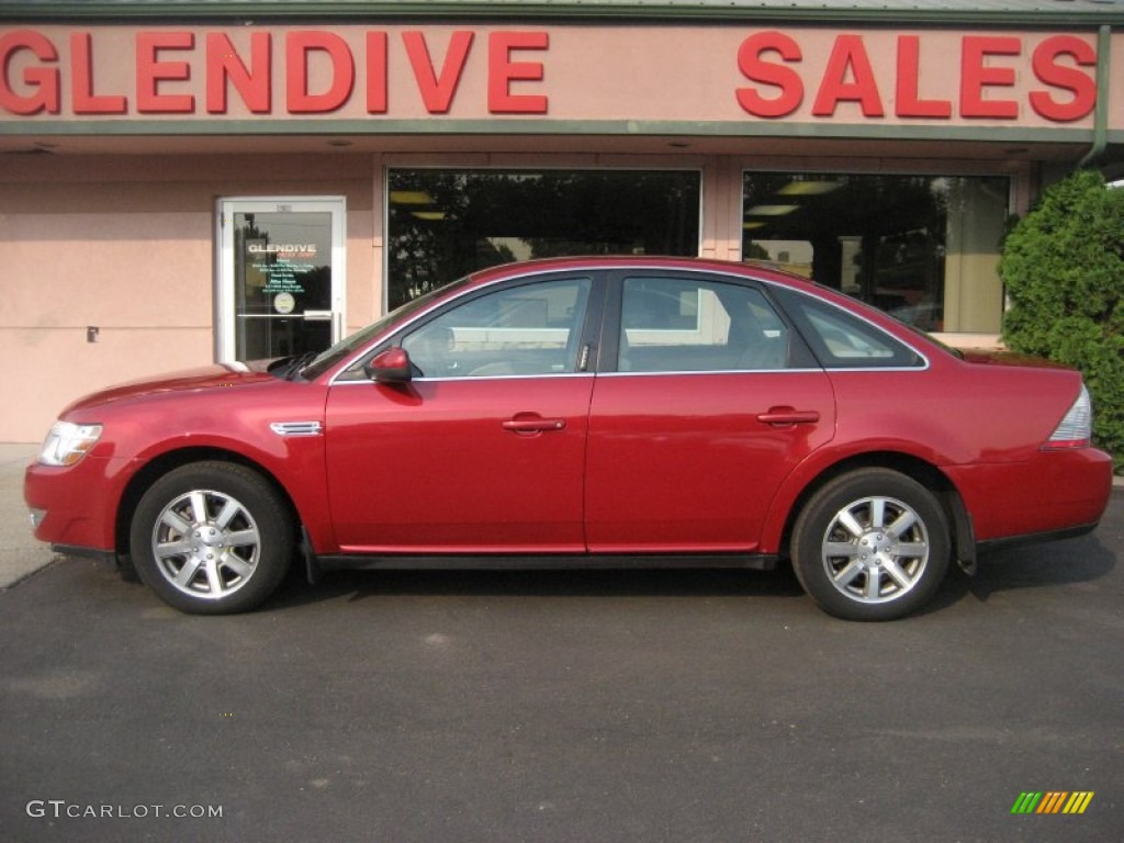 2009 Taurus SEL AWD - Sangria Red Metallic / Medium Light Stone photo #2