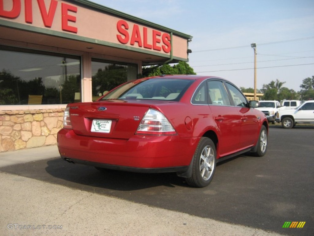 2009 Taurus SEL AWD - Sangria Red Metallic / Medium Light Stone photo #6