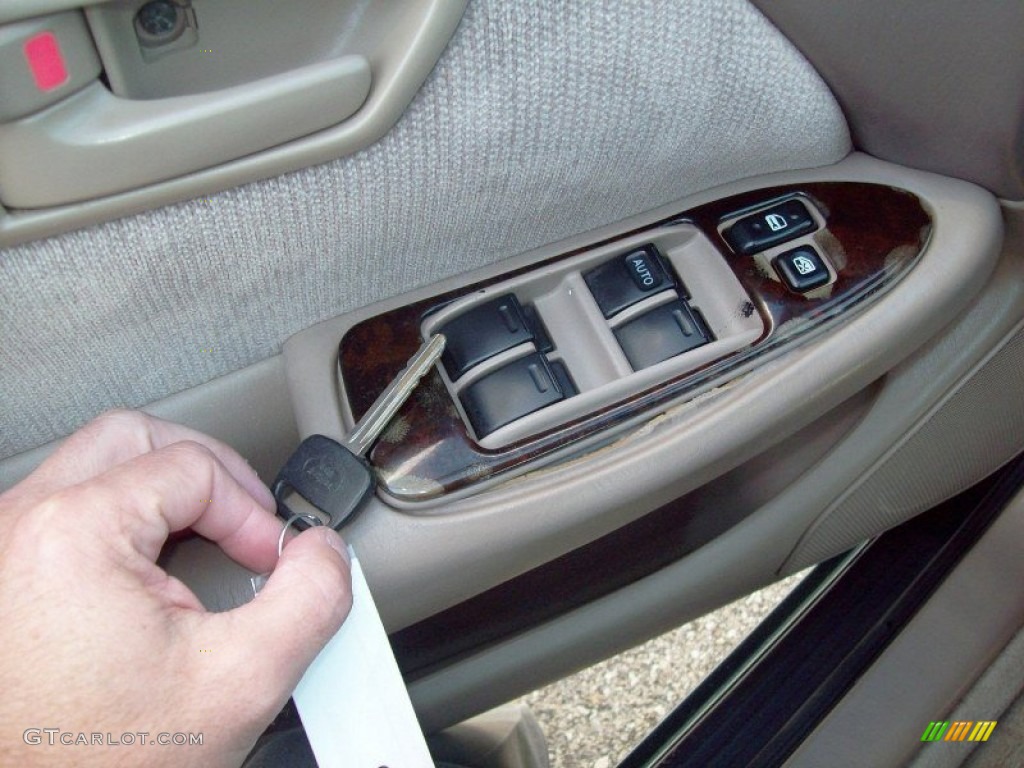 1998 Camry CE - Dark Green Metallic / Oak photo #5