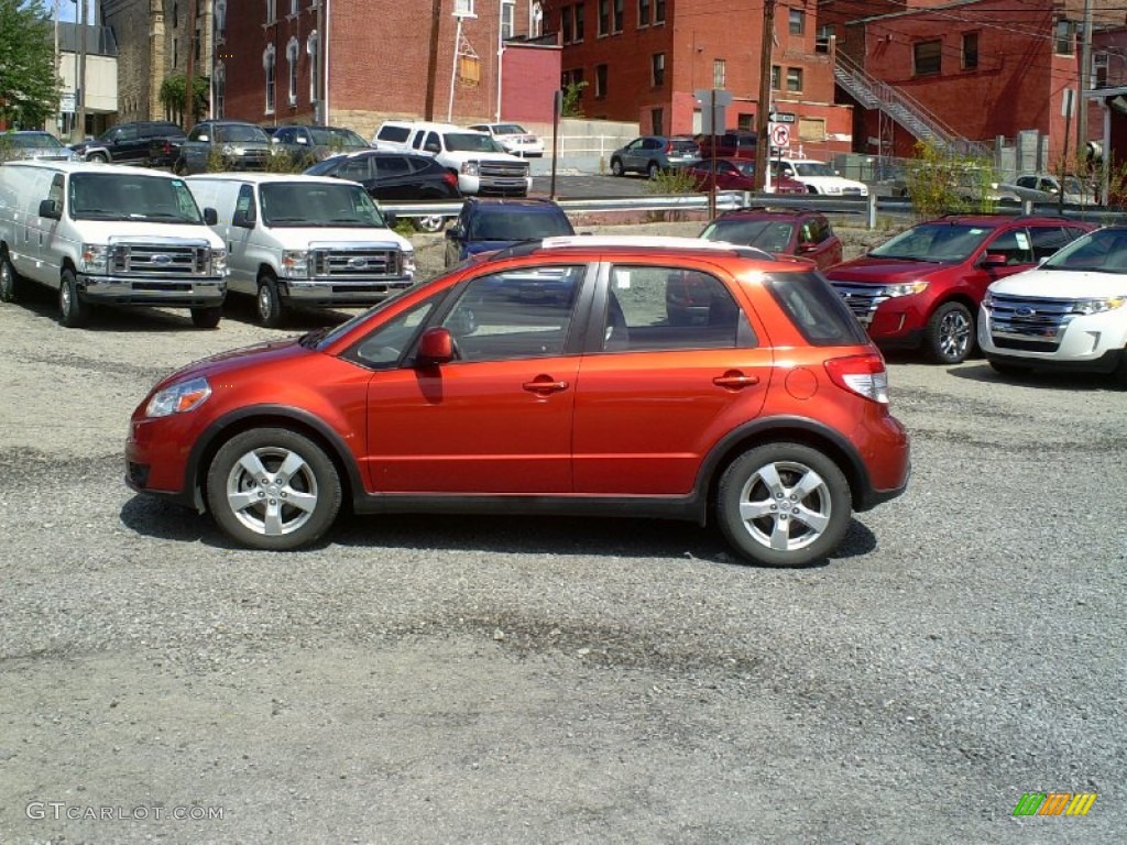 2010 SX4 Crossover Touring AWD - Sunlight Copper Metallic / Black photo #1