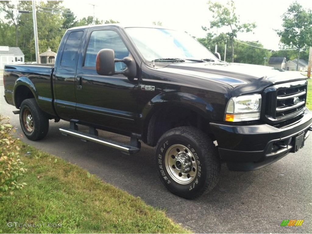 2004 F250 Super Duty XLT SuperCab 4x4 - Black / Black photo #4