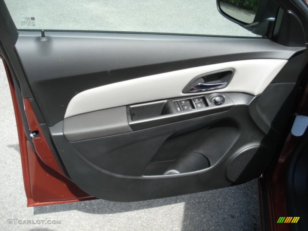 2013 Chevrolet Cruze LS Jet Black/Medium Titanium Door Panel Photo #70678216