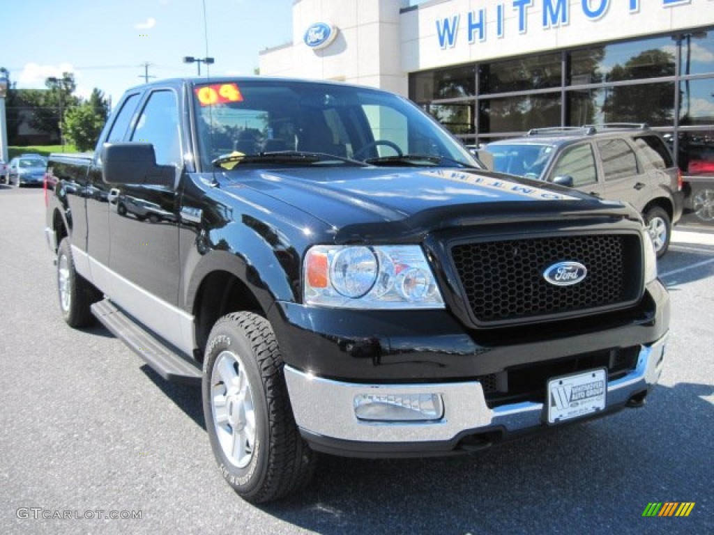 2004 F150 XLT SuperCab 4x4 - Black / Black/Medium Flint photo #2