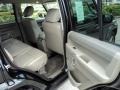 2010 Jeep Commander Dark Slate Gray Interior Door Panel Photo