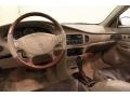 Rich Chestnut/Taupe Dashboard Photo for 2003 Buick Regal #70734981