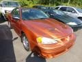 2004 Fusion Orange Metallic Pontiac Grand Am GT Sedan #70748913