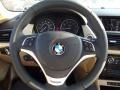 Beige 2013 BMW X1 sDrive 28i Steering Wheel