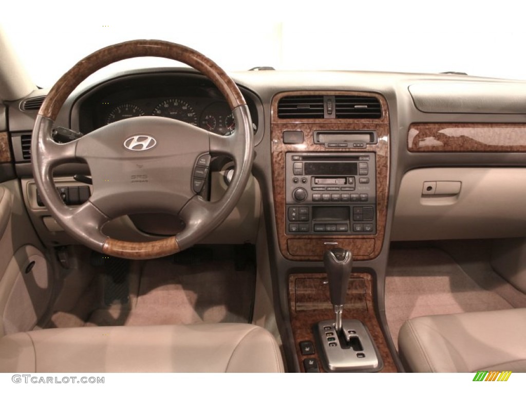 2004 XG350 Sedan - Black Obsidian / Beige photo #16
