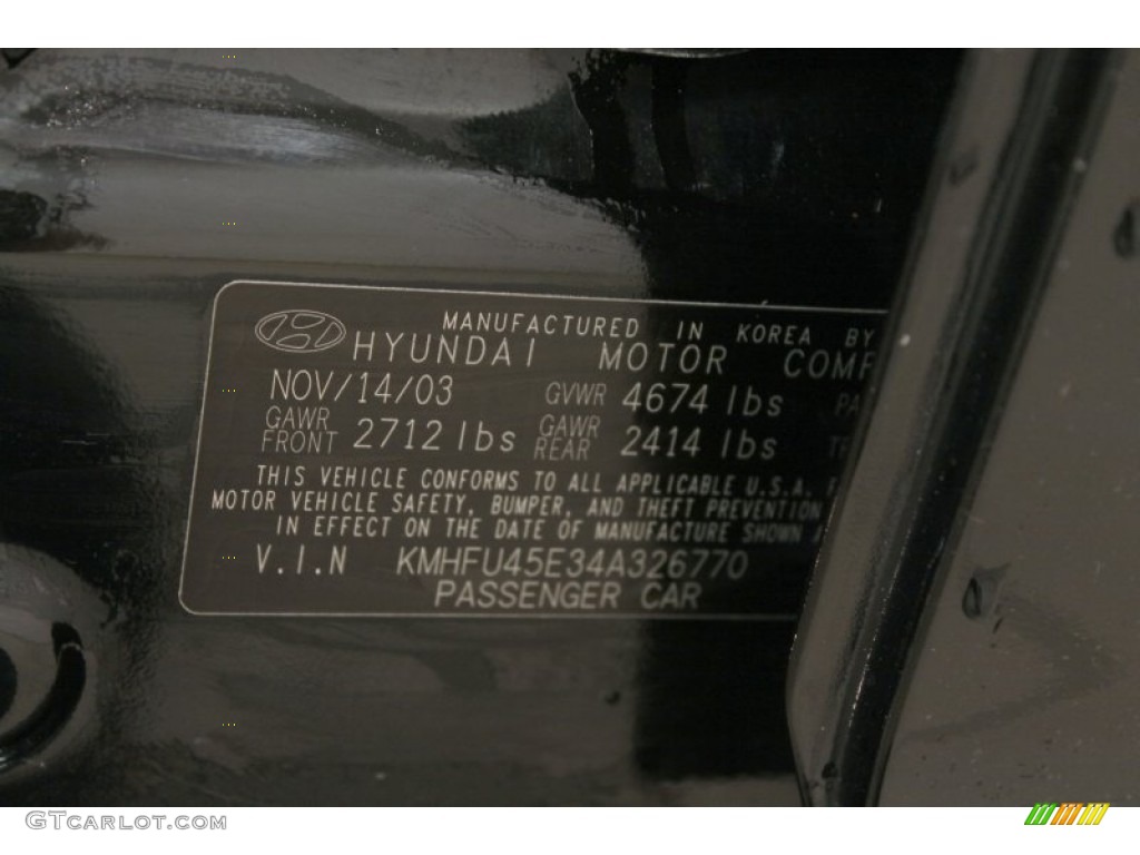 2004 XG350 Sedan - Black Obsidian / Beige photo #20