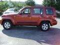 2009 Sunburst Orange Pearl Jeep Liberty Sport 4x4  photo #6