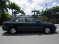 2003 Evergreen Kia Spectra Sedan  photo #18