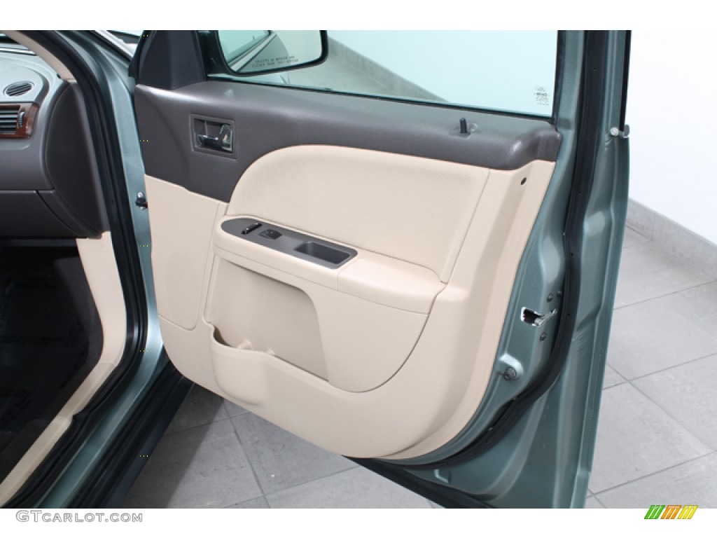 2008 Ford Taurus SEL Medium Light Stone Door Panel Photo #70872718