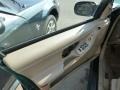 1996 Buick Skylark Taupe Interior Door Panel Photo