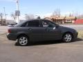 2005 Liquid Grey Metallic Ford Focus ZX4 SES Sedan  photo #5