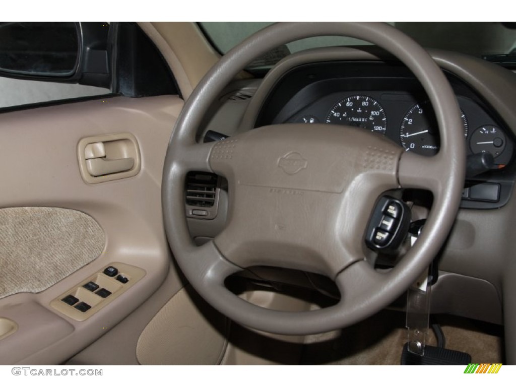 1997 Maxima GXE - Pebble Beige Metallic / Beige photo #22