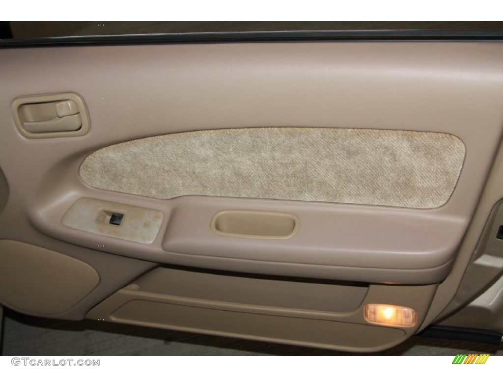 1997 Maxima GXE - Pebble Beige Metallic / Beige photo #26