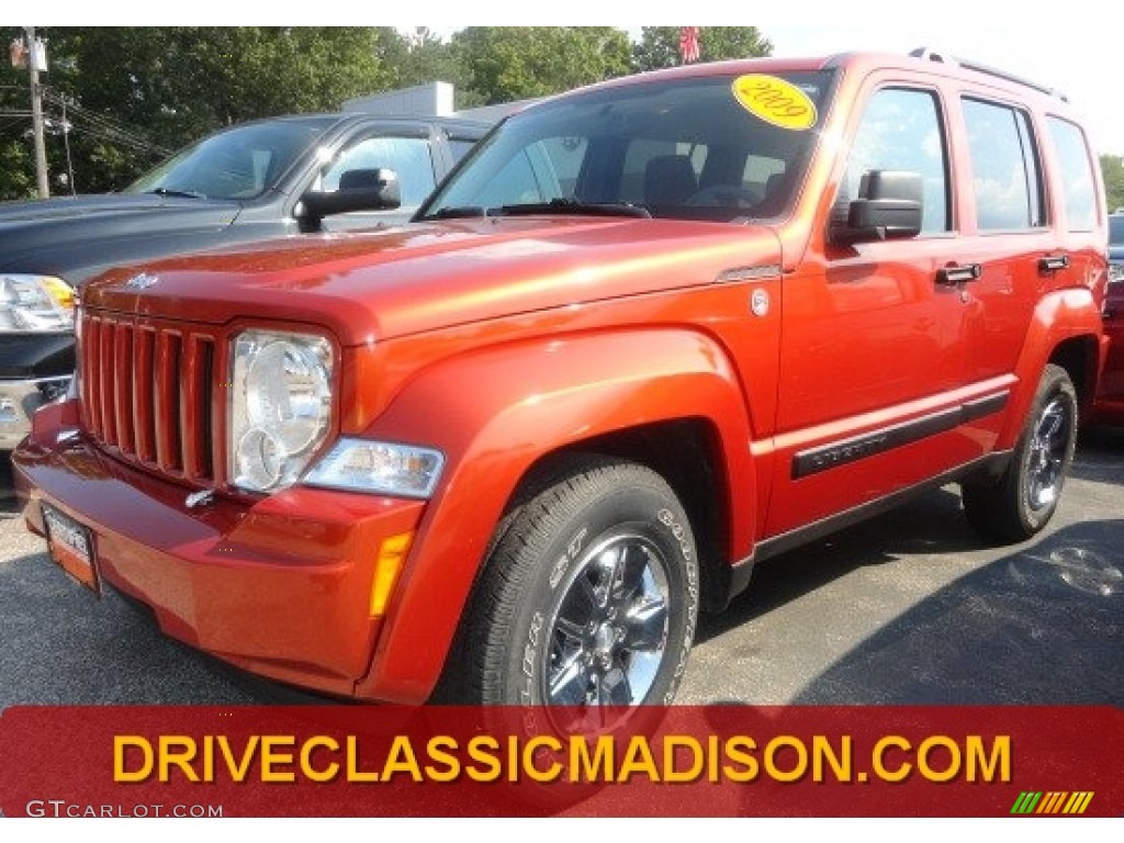 Sunburst Orange Pearl Jeep Liberty