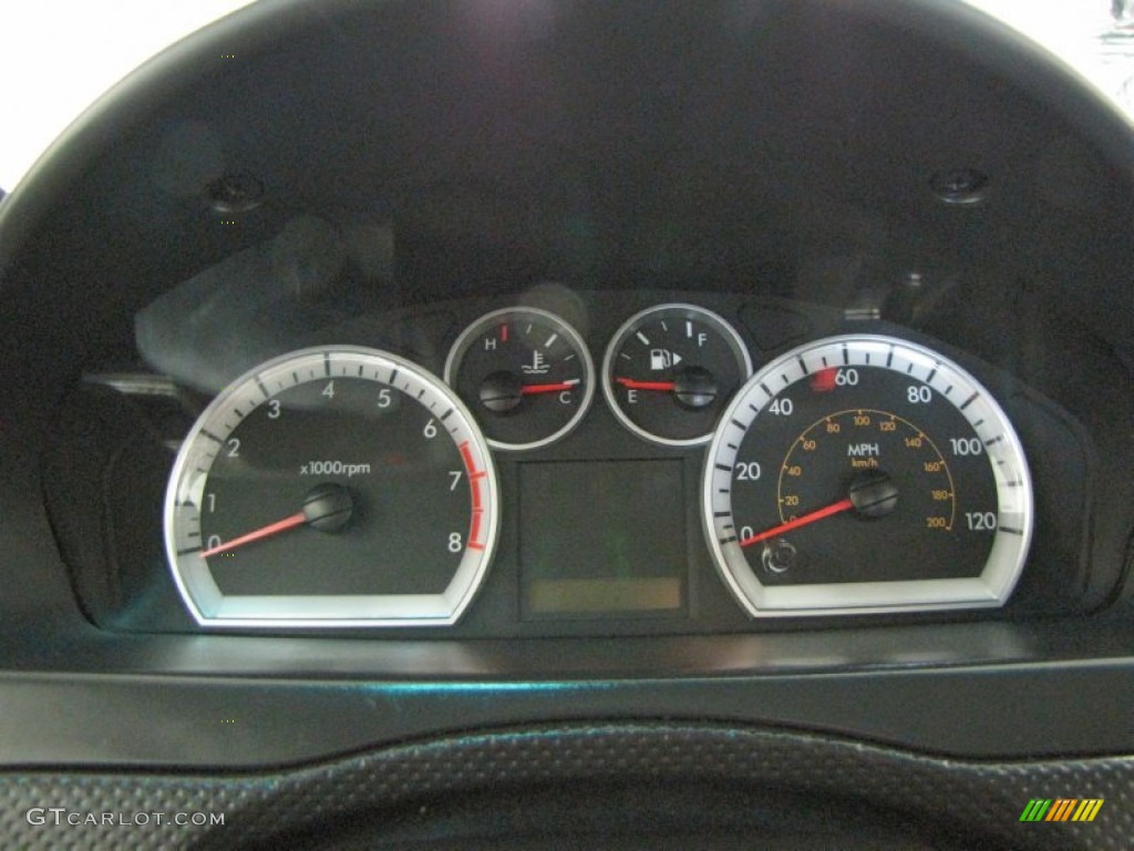 2011 Chevrolet Aveo LT Sedan Gauges Photo #71005138