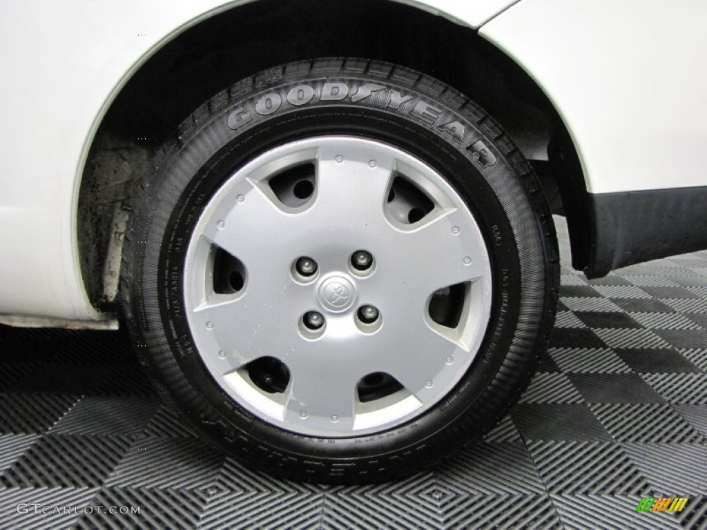 2002 Toyota ECHO Sedan Wheel Photo #71006526