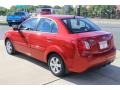 2010 Tropical Red Kia Rio LX Sedan  photo #7