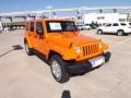 2013 Crush Orange Jeep Wrangler Unlimited Sahara 4x4  photo #7