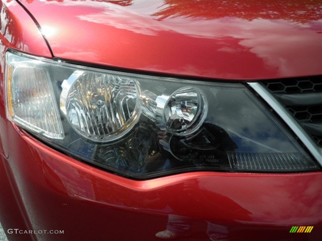 2009 Outlander ES - Rally Red Metallic / Black photo #3