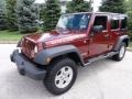 2010 Red Rock Crystal Pearl Jeep Wrangler Unlimited Rubicon 4x4  photo #2