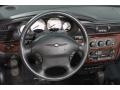 2001 Chrysler Sebring Royal Blue/Cream Interior Steering Wheel Photo