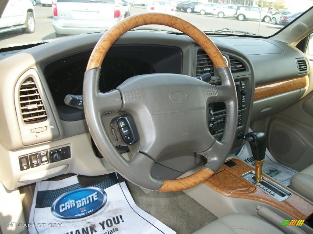 2001 QX4  - Bronze Metallic / Stone Beige photo #7