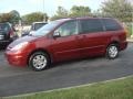 2010 Salsa Red Pearl Toyota Sienna LE  photo #5