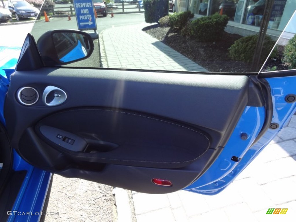 2010 Nissan 370Z Sport Coupe Black Cloth Door Panel Photo #71124080