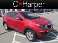 2012 Signal Red Kia Sportage LX AWD  photo #1