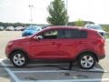 2012 Signal Red Kia Sportage LX AWD  photo #7