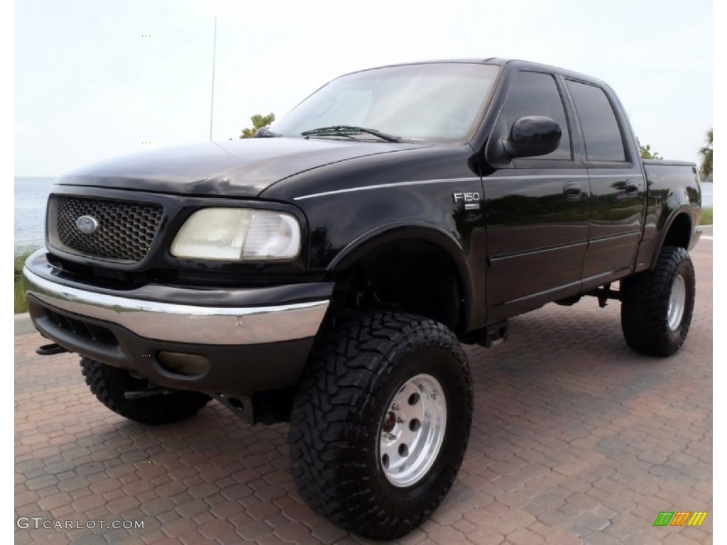 2002 F150 Lariat SuperCrew 4x4 - Black / Medium Graphite photo #1