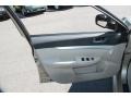 Warm Ivory 2010 Subaru Legacy 2.5i Premium Sedan Door Panel