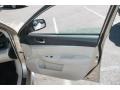 Warm Ivory 2010 Subaru Legacy 2.5i Premium Sedan Door Panel