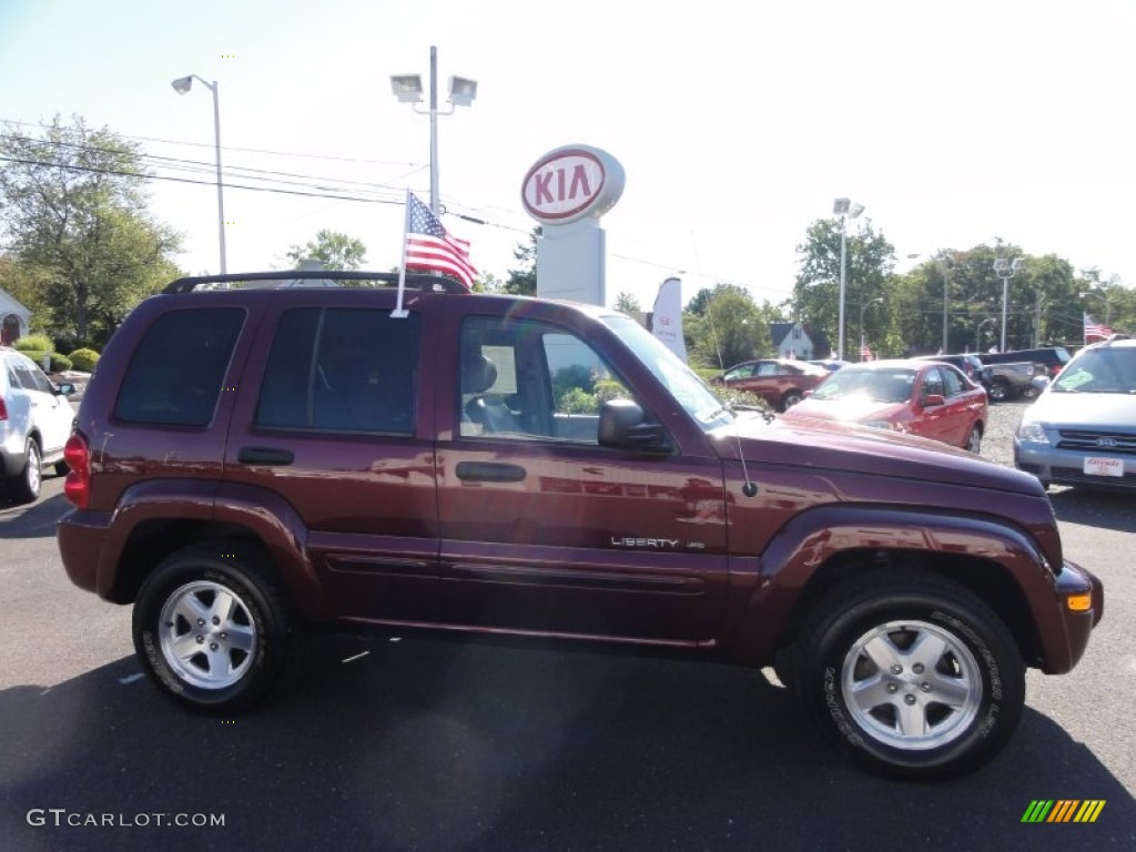 2003 Liberty Limited 4x4 - Dark Garnet Red Pearl / Taupe photo #5