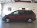 2010 Salsa Red Pearl Toyota Sienna LE  photo #2