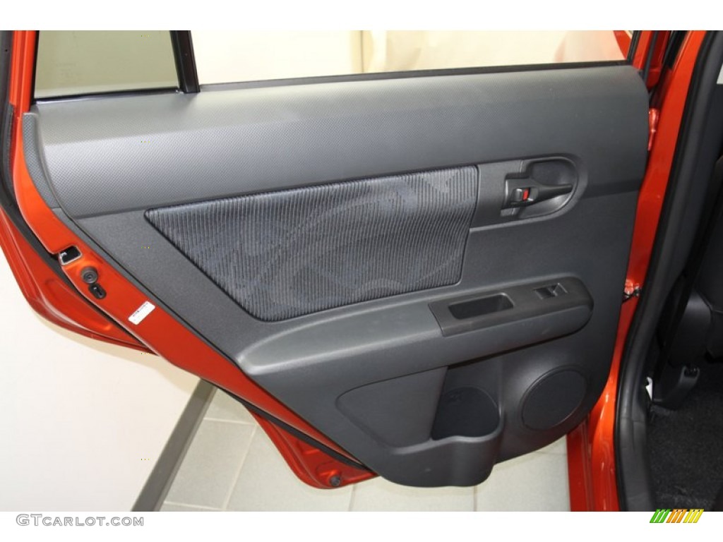 2012 Scion xB Release Series 9.0 RS Suede Style Dark Gray/Hot Lava Door Panel Photo #71243086