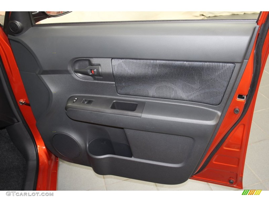 2012 Scion xB Release Series 9.0 RS Suede Style Dark Gray/Hot Lava Door Panel Photo #71243155