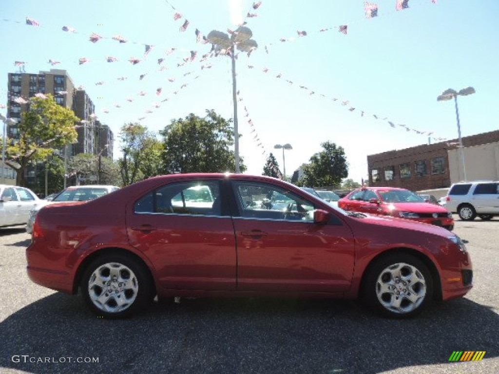2010 Fusion SE - Red Candy Metallic / Charcoal Black photo #5