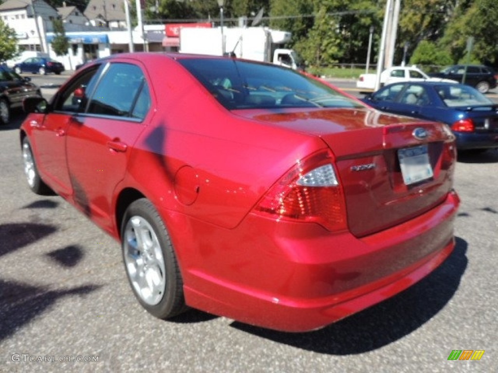 2010 Fusion SE - Red Candy Metallic / Charcoal Black photo #9