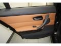 Saddle Brown Dakota Leather Door Panel Photo for 2011 BMW 3 Series #71389201