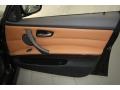 Saddle Brown Dakota Leather Door Panel Photo for 2011 BMW 3 Series #71389285