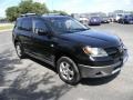 Front 3/4 View of 2004 Outlander XLS